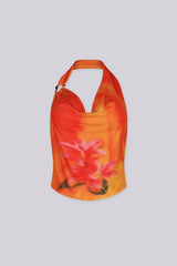 Sheer mesh floral print halter neck crop top
Polished metal ring hardware at the neckline
Open back design for a bold sensual look