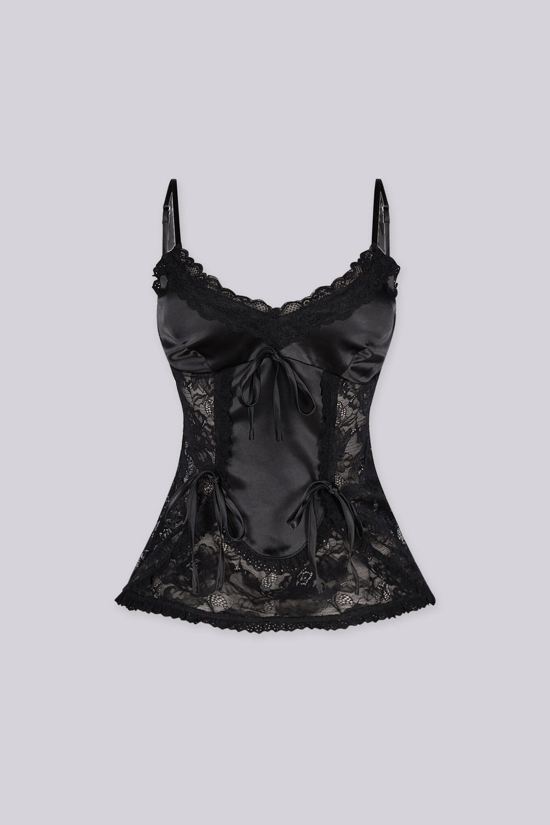 Romantic lingerie inspired cami top
Finished with front bow accents and scalloped lace hemline