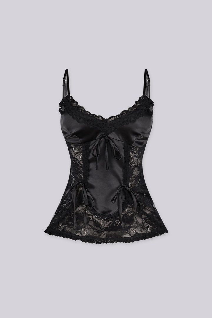 Romantic lingerie inspired cami top
Finished with front bow accents and scalloped lace hemline