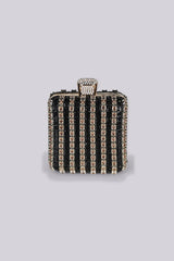 Structured rectangular frame mini clutch bag with oversized top clasp closure featuring rhinestone embellishment details