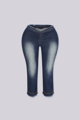 Slim fit low rise denim capri with frayed hem, Waistband dips into a deep V at the center front featuring raw edge finish