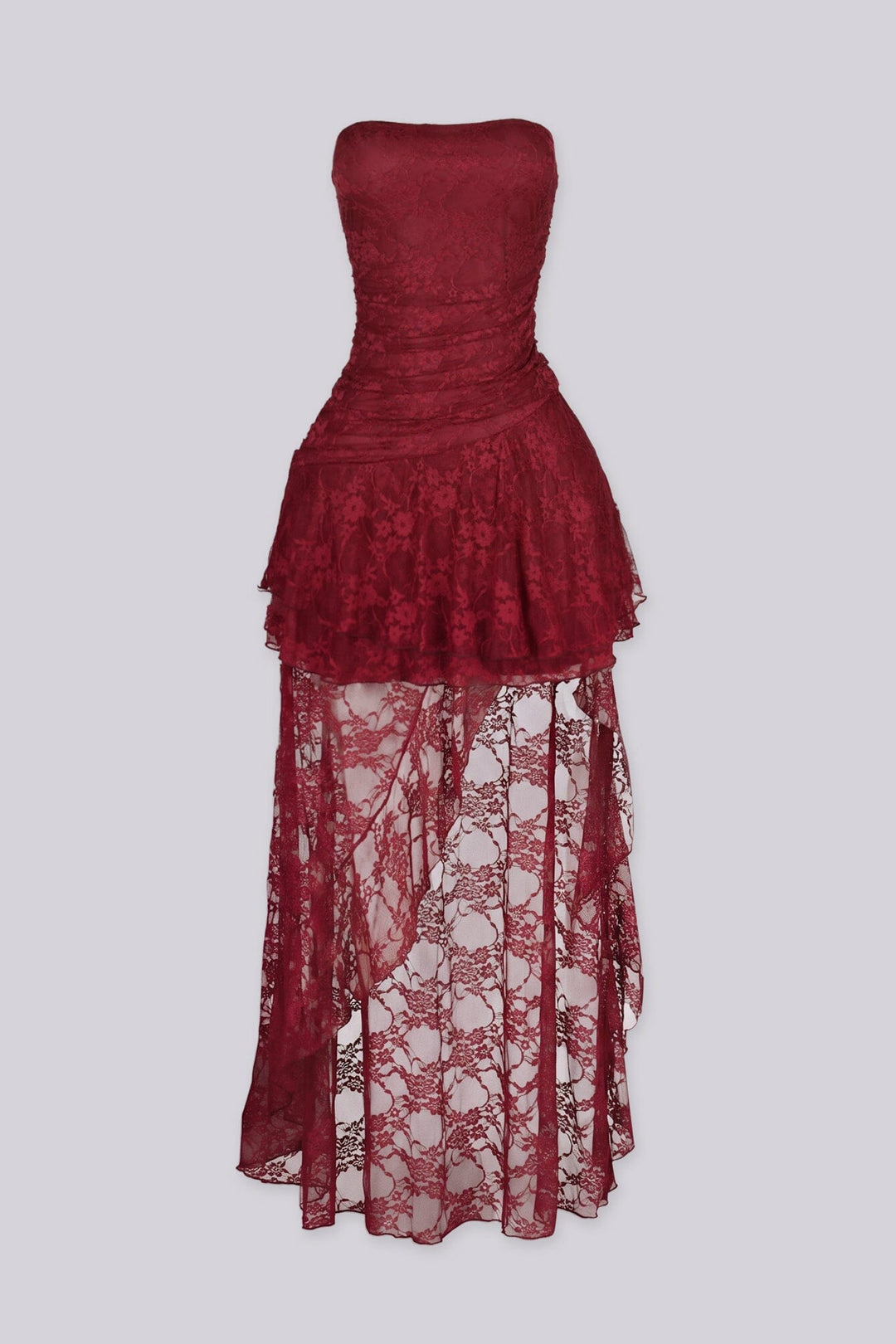 Sheer floral lace dress with draped ruched bodice gathering across the bust and tiered ruffle lace overlay drops from the hip in cascading layers