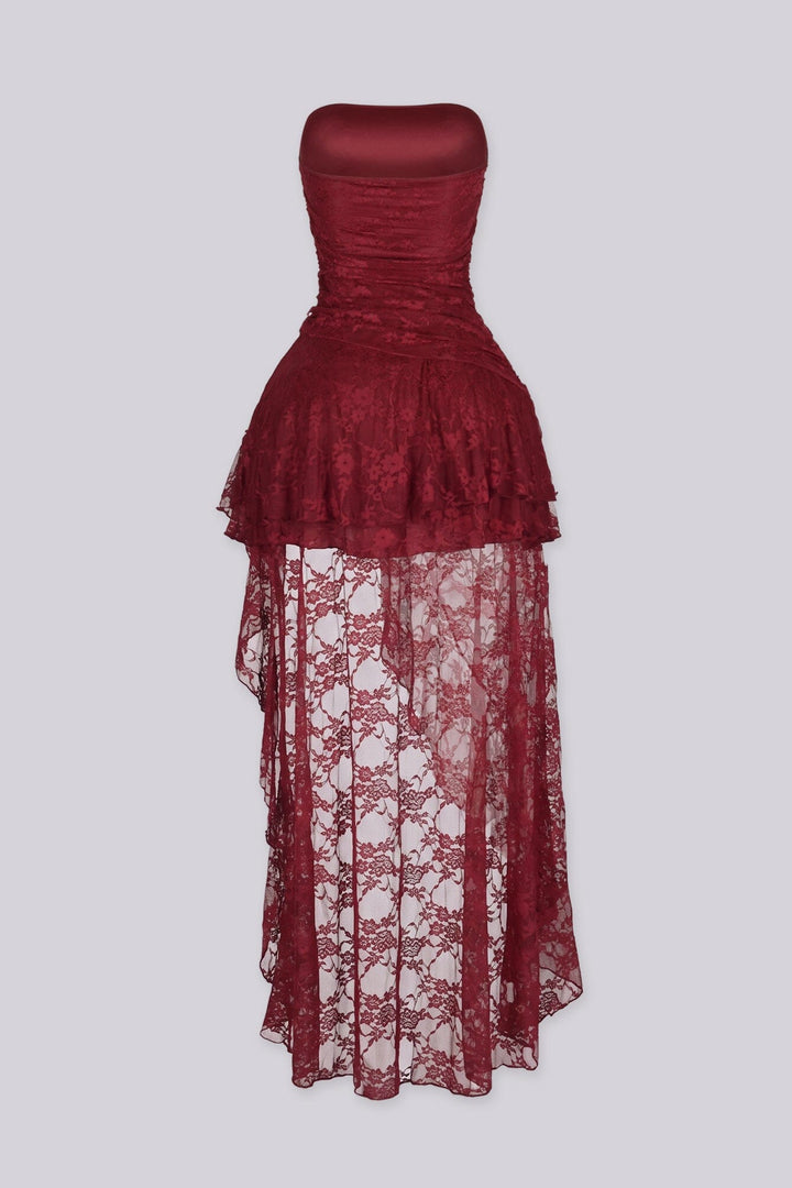 Sheer floral lace dress with draped ruched bodice gathering across the bust and tiered ruffle lace overlay drops from the hip in cascading layers
