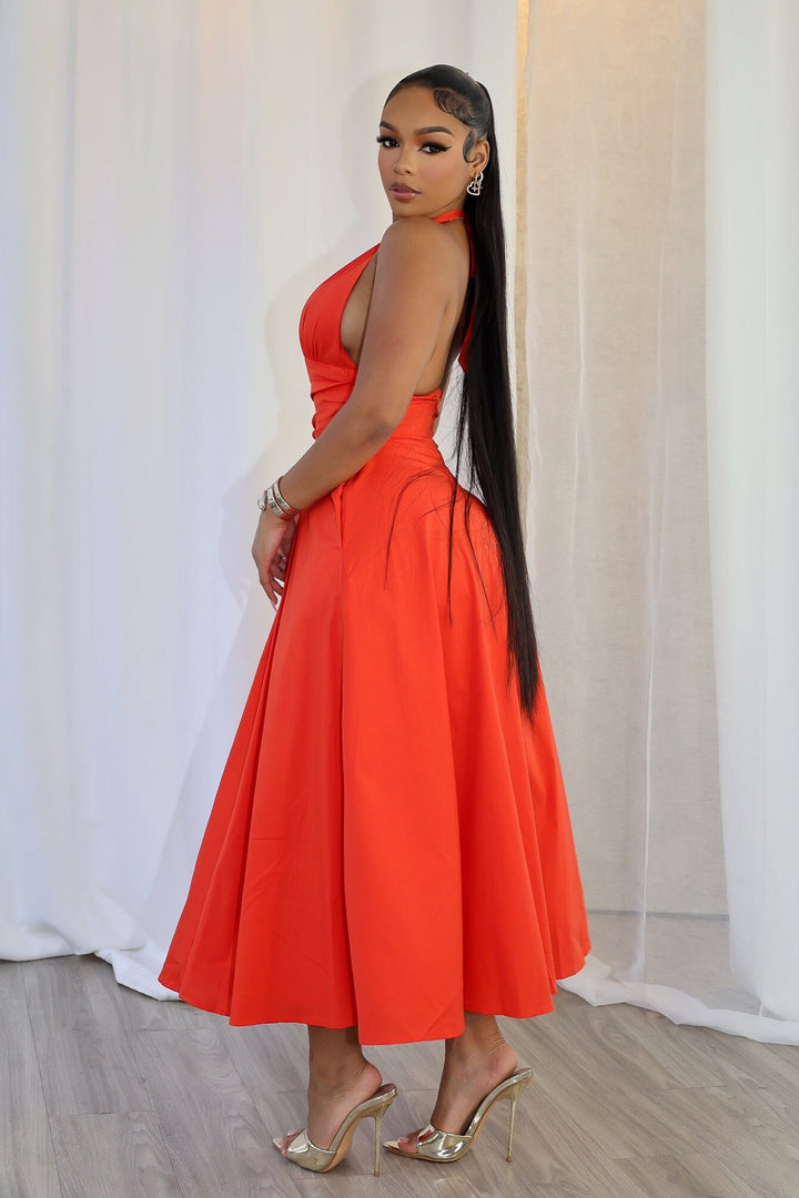 EDGE — tomato red poplin halter neck midi dress with an open back and tie neck, back view on model