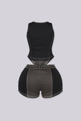 Two tone black tank top featuring decorative front bands with metallic buttons