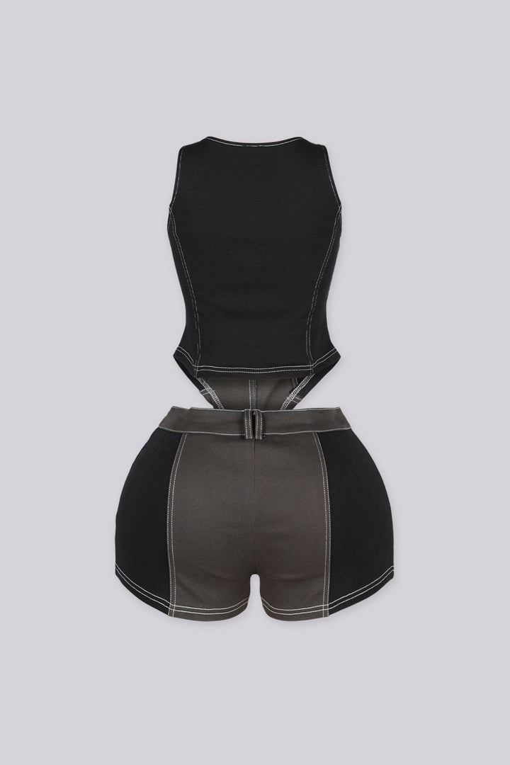 Two tone black tank top featuring decorative front bands with metallic buttons