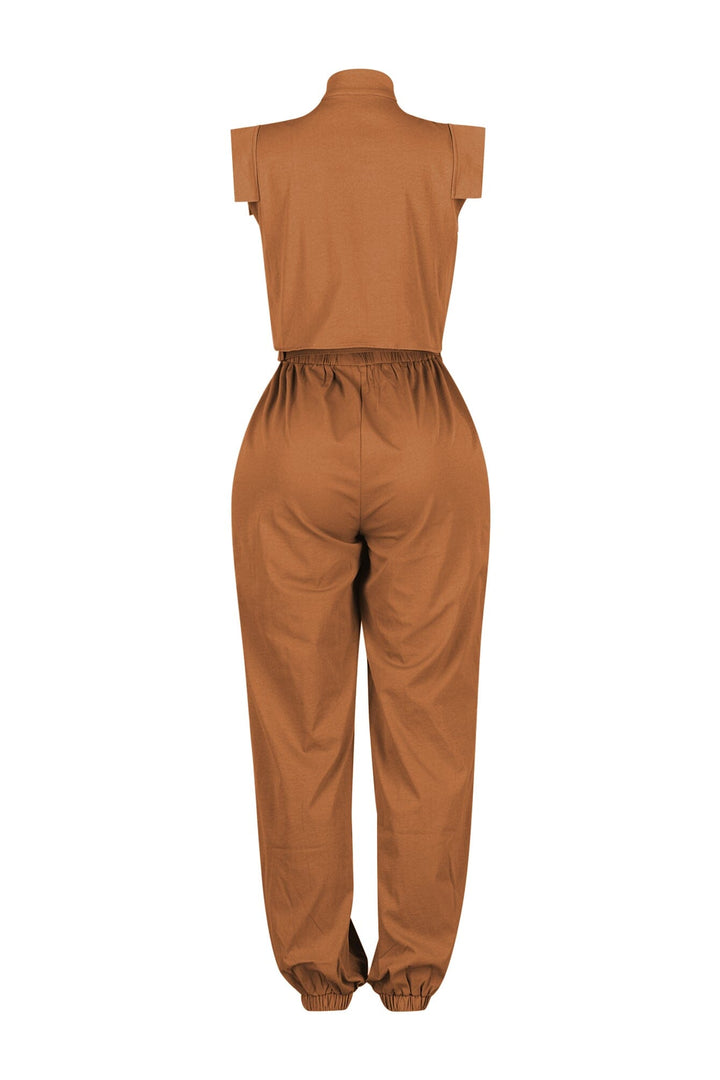 Cargo style jogger jumpsuit with high neck collar featuring elasticized cinched waistband and utility pockets
Comes with a detachable belt