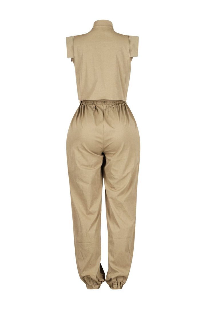 Cargo style jogger jumpsuit with high neck collar featuring elasticized cinched waistband and utility pockets
Comes with a detachable belt