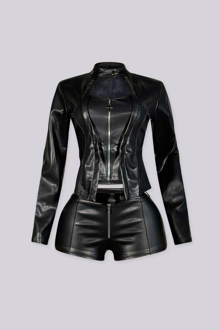 Cropped moto jacket with a stand collar and snap closure featuring princess seams and a front zipper with charm pull