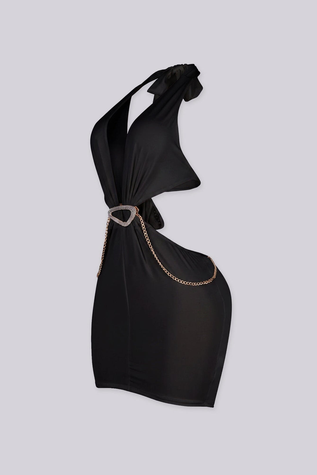 Plunging halter mini dress with dramatic side cut-outs
Asymmetrical gold ring detail with edgy gold chain around the neck