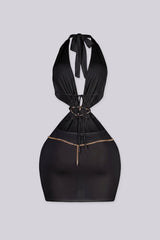 Plunging halter mini dress with dramatic side cut-outs
Asymmetrical gold ring detail with edgy gold chain around the neck