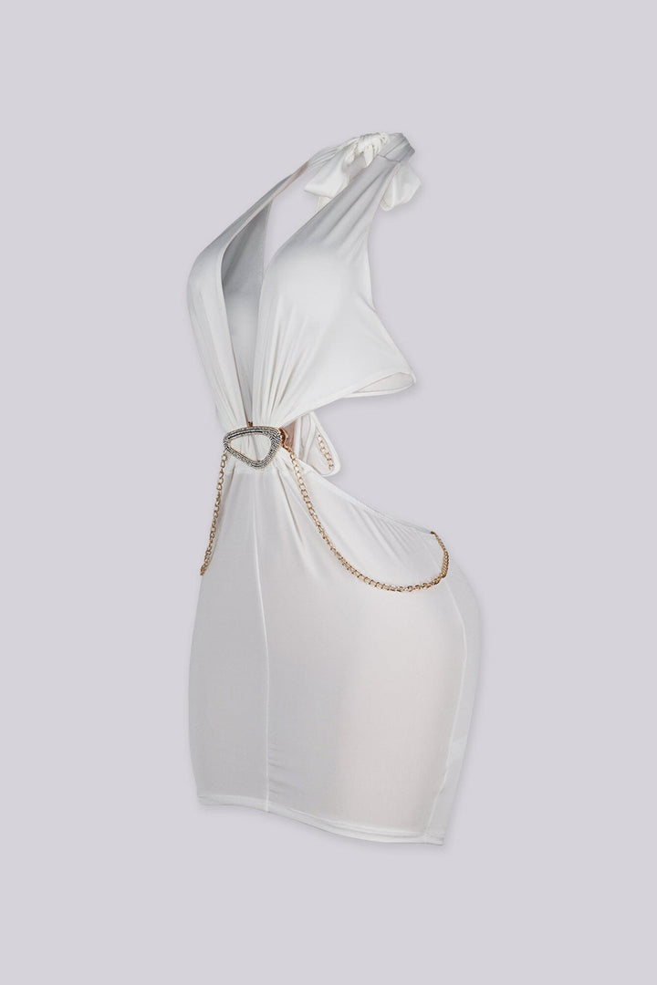 Plunging halter mini dress with dramatic side cut-outs
Asymmetrical gold ring detail with edgy gold chain around the neck