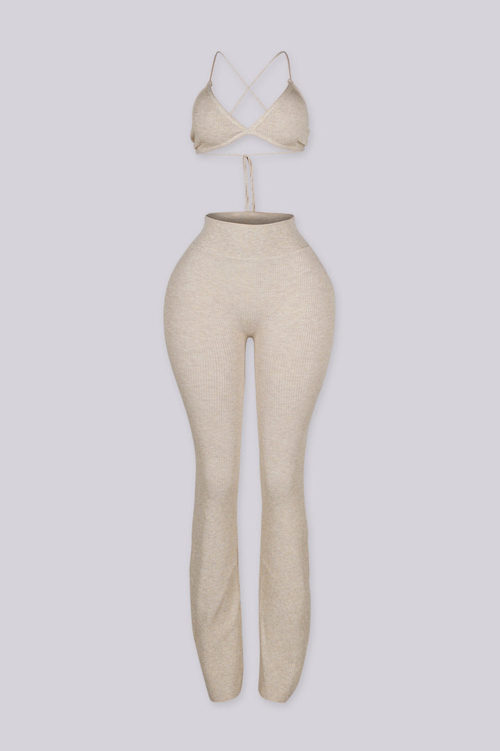 Ribbed knit triangle bralette top with thin adjustable spaghetti straps that tie behind the neck and back