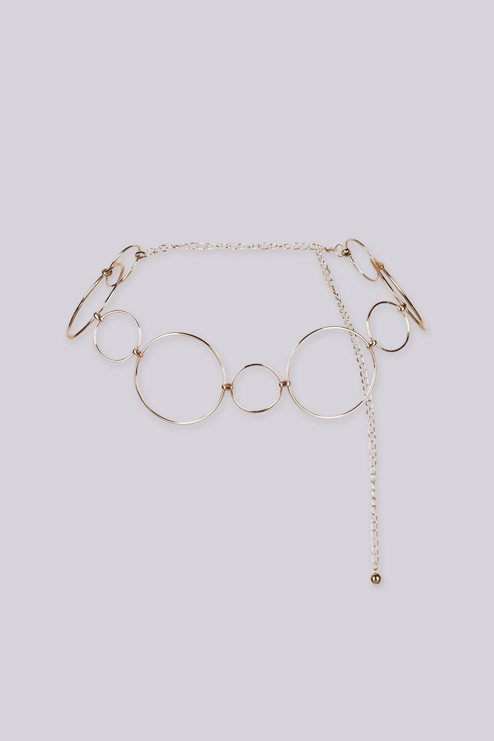 Metallic chain waist belt with a geometric O rings in varying sizes