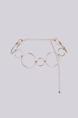 Statement bracelet featuring a series of interlocking metal circles in varying sizes