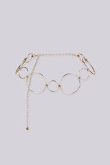 Statement bracelet featuring a series of interlocking metal circles in varying sizes