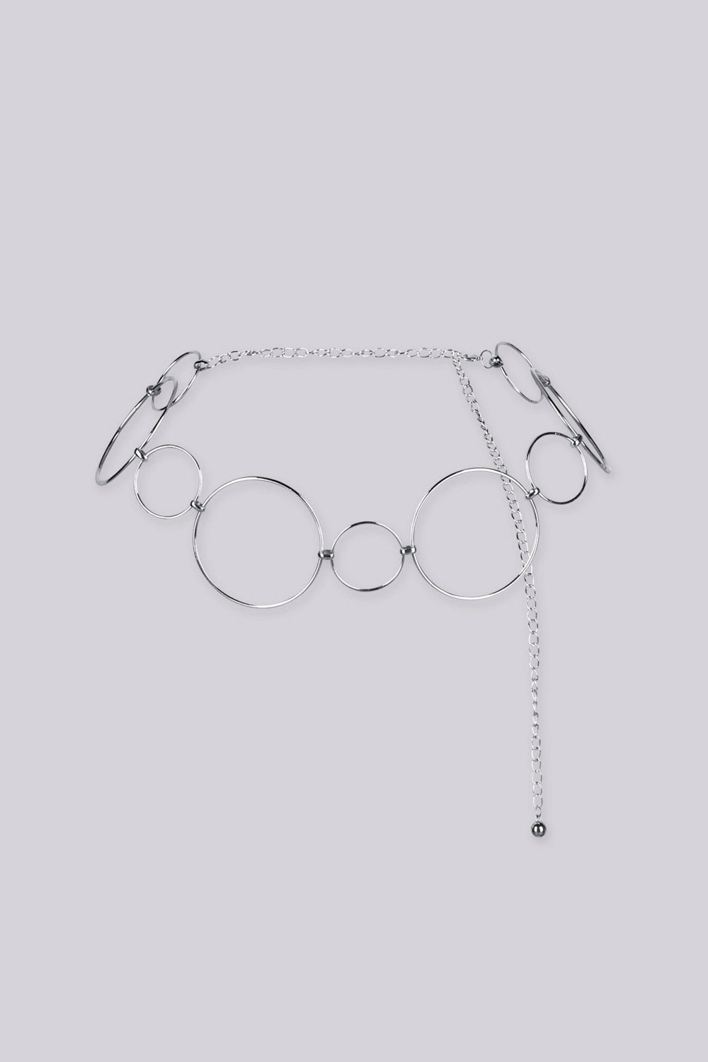 Statement bracelet featuring a series of interlocking metal circles in varying sizes