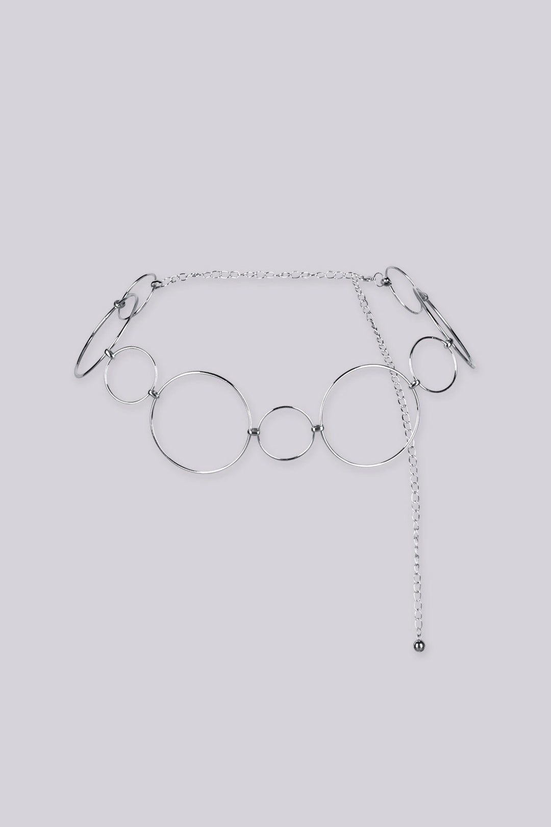 Statement bracelet featuring a series of interlocking metal circles in varying sizes