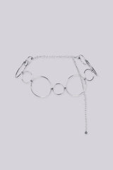 Statement bracelet featuring a series of interlocking metal circles in varying sizes
