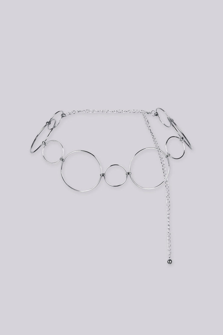 Statement bracelet featuring a series of interlocking metal circles in varying sizes