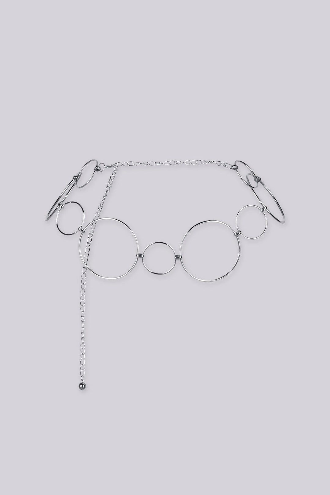 Statement bracelet featuring a series of interlocking metal circles in varying sizes