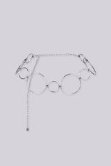 Statement bracelet featuring a series of interlocking metal circles in varying sizes