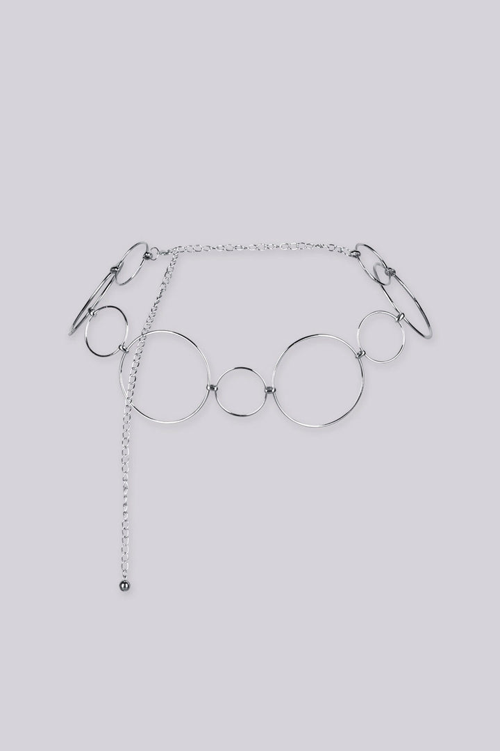 Statement bracelet featuring a series of interlocking metal circles in varying sizes