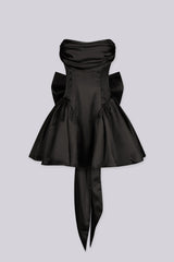 Off the shoulder fitted bodice satin mini dress with draped fold over neckline featuring dropped waistline and layers of full tiered ruffle skirt