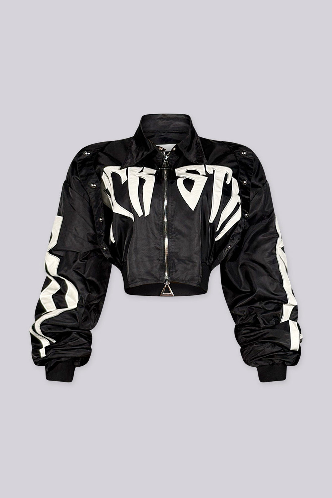 Cropped bomber jacket with a collared snap button placket featuring graphic lettering print and heavily ruched sleeve detail