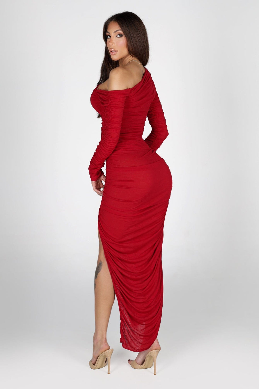 Off shoulder asymmetric neckline maxi dress with long ruched sleeves