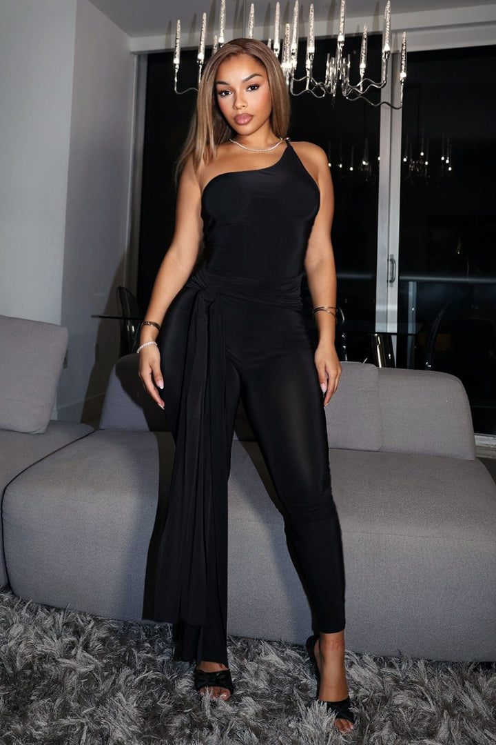 Fitted one shoulder jumpsuit featuring decorative gold tone hardware clasp