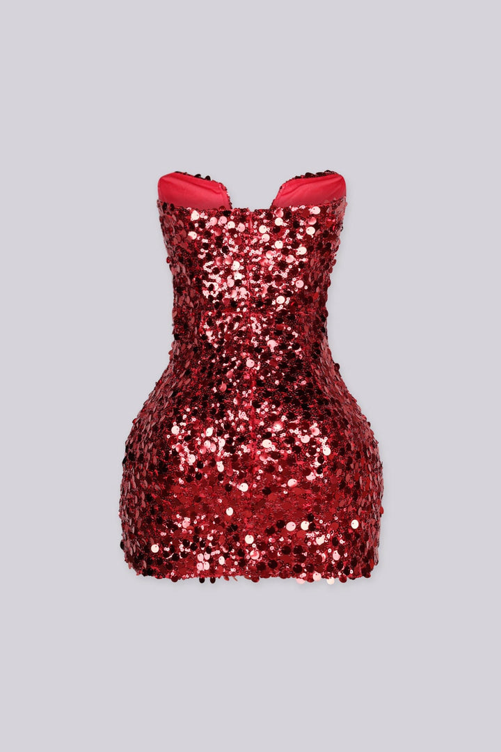 Strapless fitted bodice mini dress with wired plunging notched sweetheart neckline featuring oversized sequins detailing throughout