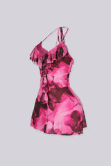 Halter mini dress with a plunging scooped neckline
Layered ruffle detailing along the neckline and cascades down the center front bust and bodice