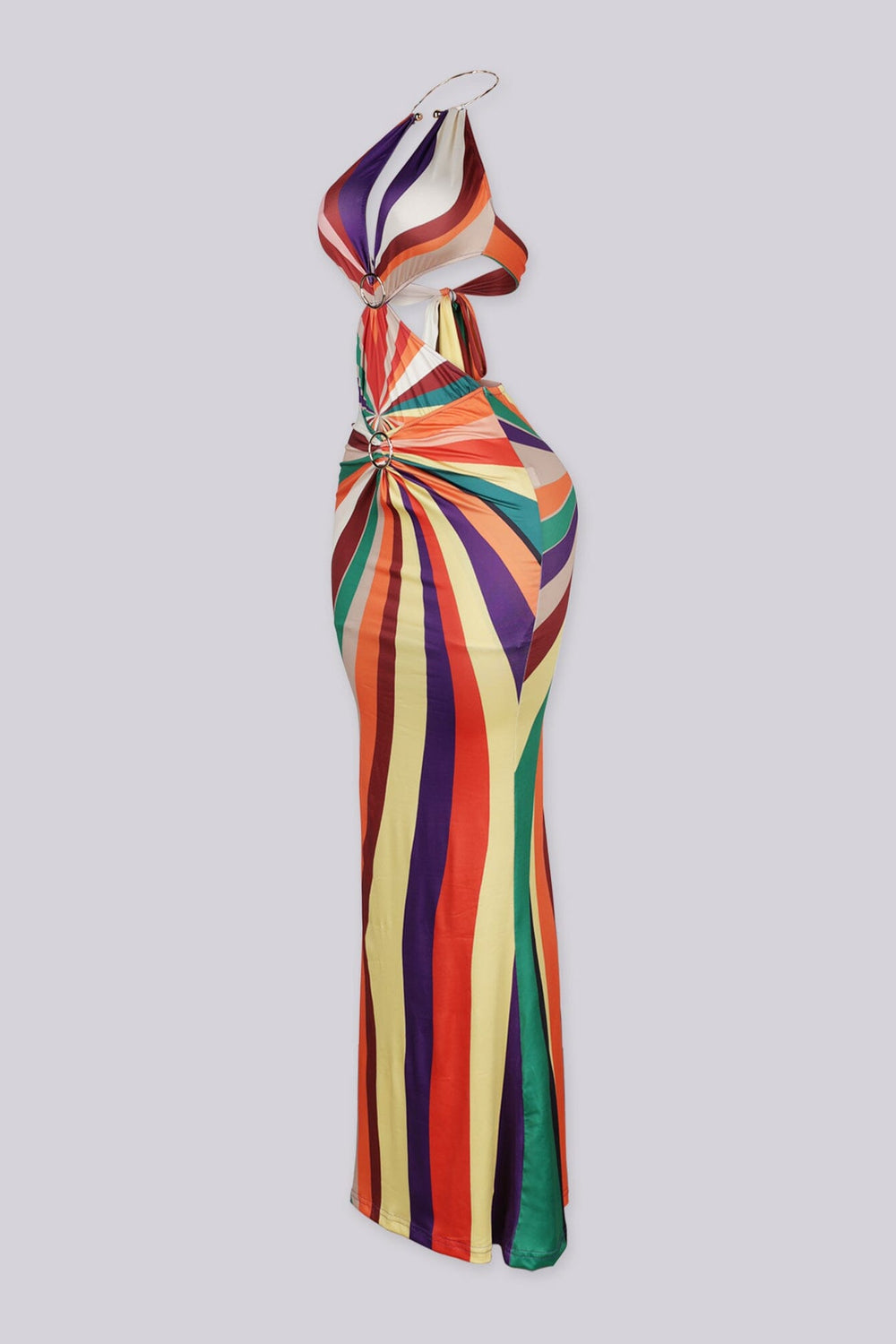 Gold O ring halter maxi dress featuring multi color print with side cutout detailing