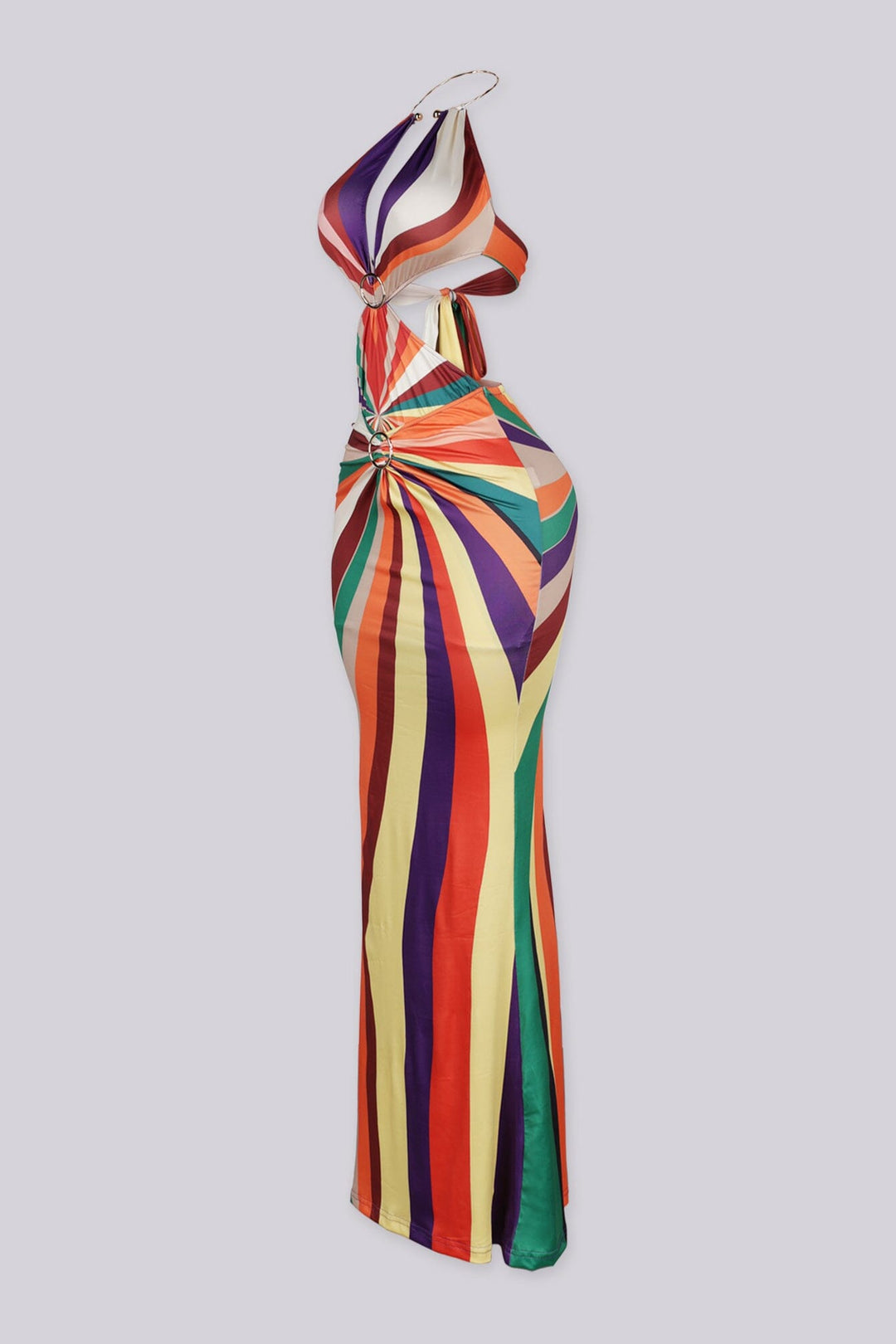 Gold O ring halter maxi dress featuring multi color print with side cutout detailing