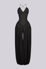 Halter neck jumpsuits with semi sheer mesh wide leg pants featuring gathering at the ankles
Open back with crisscross lace-up closure