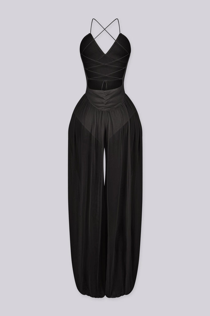 Halter neck jumpsuits with semi sheer mesh wide leg pants featuring gathering at the ankles
Open back with crisscross lace-up closure