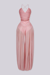 Halter neck jumpsuits with semi sheer mesh wide leg pants featuring gathering at the ankles
Open back with crisscross lace-up closure