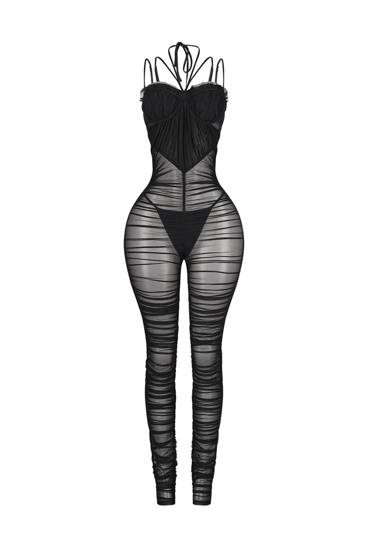 Sheer mesh strappy jumpsuit featuring a ruched bodice and an underwired bustier
