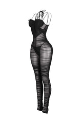 Sheer mesh strappy jumpsuit featuring a ruched bodice and an underwired bustier