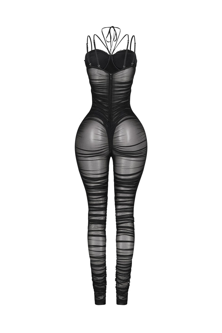 Sheer mesh strappy jumpsuit featuring a ruched bodice and an underwired bustier