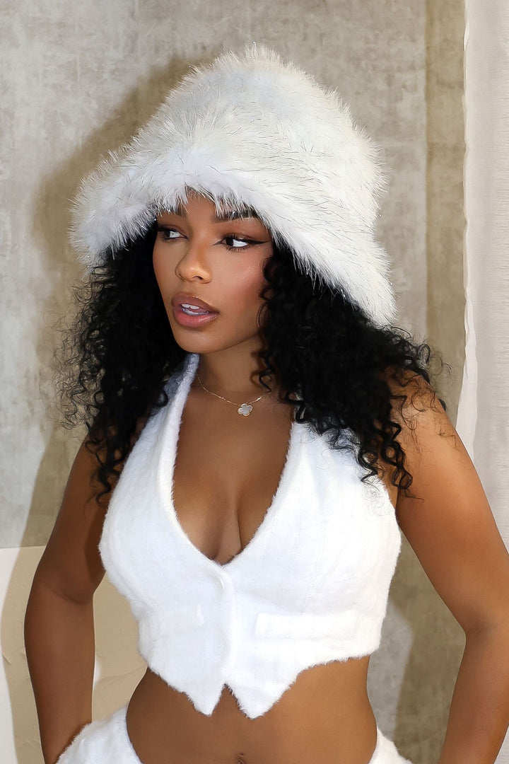 EDGE — white faux fur bucket hat worn by a model with a matching fur vest