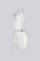Cropped halter top with lace up panel at the sides featuring metal zipper closure at center front
Paired with a matching mini skirt with lace up panel at the sides