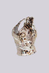 Animal print halter crop top with deep plunging cowl style neckline