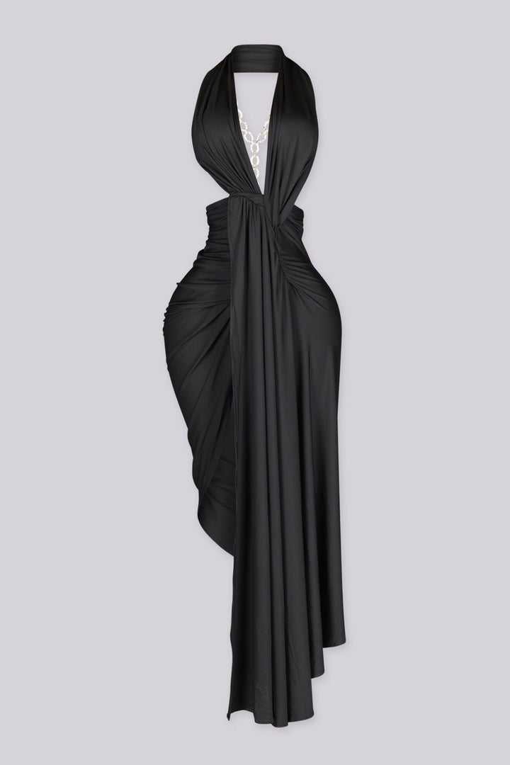 Wide halter neckline dress with deep plunging V front featuring bold side cut out at midriff
Asymmetrical hemline skirt with open back design with statement gold chain detail