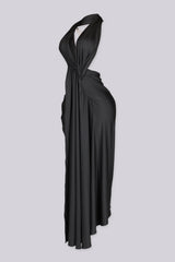 Wide halter neckline dress with deep plunging V front featuring bold side cut out at midriff
Asymmetrical hemline skirt with open back design with statement gold chain detail