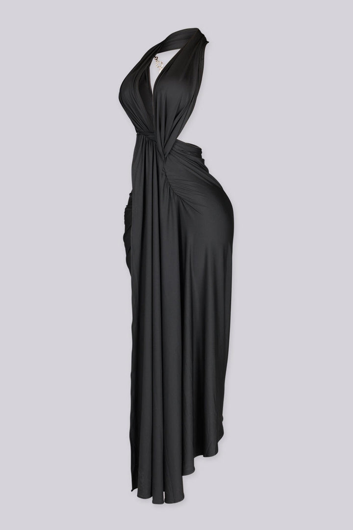 Wide halter neckline dress with deep plunging V front featuring bold side cut out at midriff
Asymmetrical hemline skirt with open back design with statement gold chain detail