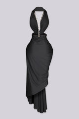 Wide halter neckline dress with deep plunging V front featuring bold side cut out at midriff
Asymmetrical hemline skirt with open back design with statement gold chain detail