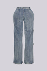 High-waisted wide leg medium wash jeans featuring stud-lined front pockets and dangling straps with silver O-ring hardware