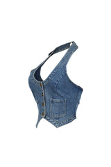 Cropped halter denim vest with deep scoop neckline featuring adjustable neck strap with buckle